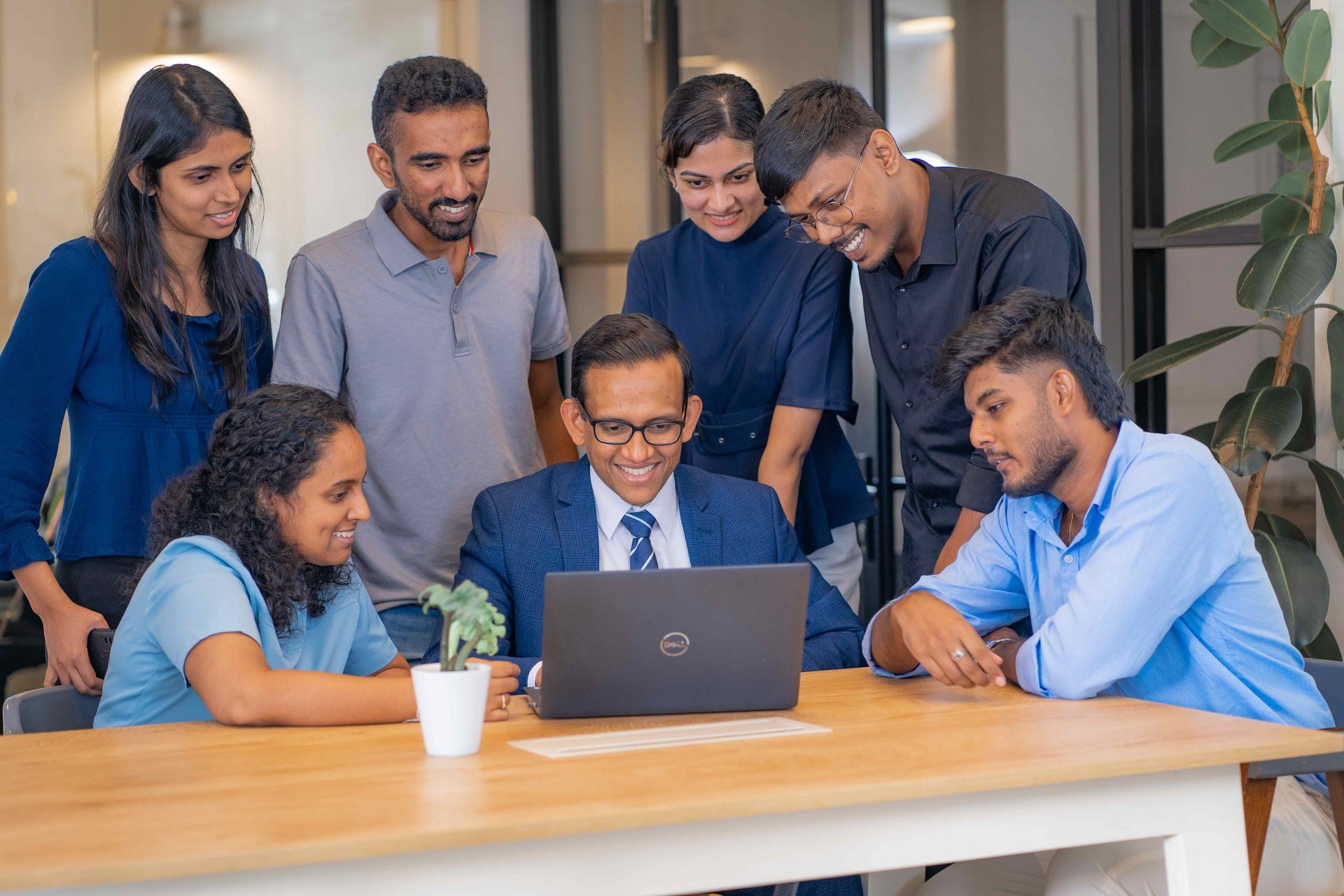 Diverse group of students and professionals collaborating together